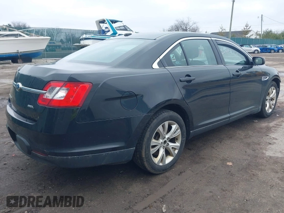 2011 Ford Taurus SEL with VIN 1FAHP2EW3BG159425, listed as a IAAI auction lot 42000815 with 217,783 mi miles and . Bid and sale history available at DreamBid. Image 4.