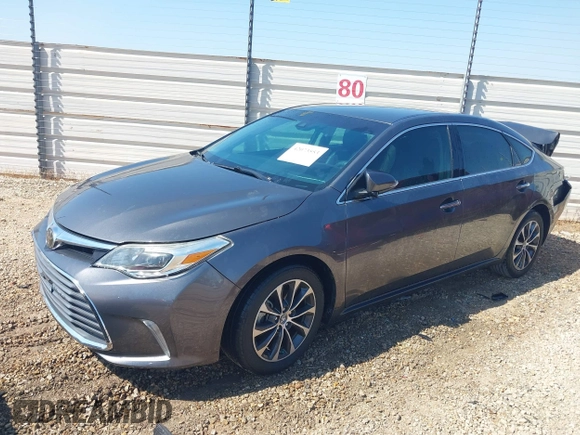 2018 Toyota Avalon XLE with VIN 4T1BK1EB1JU285770, listed as a IAAI auction lot 42073553 with 71,809 mi miles and . Bid and sale history available at DreamBid. Image 17.