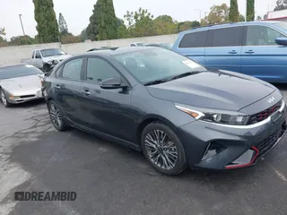 2023 Kia Forte GT-Line z VIN 3KPF54AD3PE534325, wystawiony jako IAAI lot #40483151 z przebiegiem 20 977 mil mil oraz . Historia ofert i sprzedaży dostępna na DreamBid. Obrazek 1.
