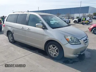 2005 Honda Odyssey EX-L with VIN 5FNRL38675B422980, listed as a IAAI auction lot 41680392 with 188,145 mi miles. Bid and sale history available at carsss.com. Image 1.