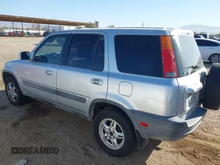 1998 Honda CR-V EX with VIN JHLRD1863WC074582, listed as a IAAI auction lot 41702456 with 243,674 mi miles. Bid and sale history available at carsss.com. Image 3.