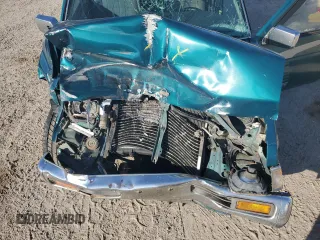 1995 Nissan Frontier XE с VIN 1N6HD16SXSC392683, выставлен на аукционе Copart как лот 59881434 с пробегом 391 479 миль миль и Списание • Salvage title. История ставок и продаж доступна на DreamBid. Изображение 12.