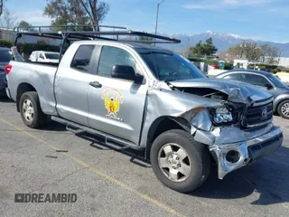 2011 Toyota Tundra z VIN 5TFRM5F17BX020720, wystawiony jako IAAI lot #41486995 z przebiegiem 111 281 mil mil oraz . Historia ofert i sprzedaży dostępna na DreamBid. Obrazek 1.