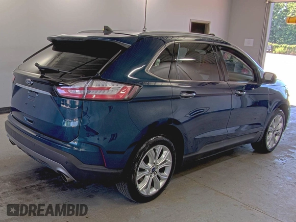 2020 Ford Edge Titanium z VIN 2FMPK3K91LBB37761, wystawiony jako IAAI lot #42829390 z przebiegiem 90 117 mil mil oraz . Historia ofert i sprzedaży dostępna na DreamBid. Obrazek 10.