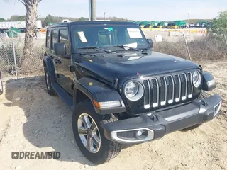 2021 Jeep Wrangler Unlimited Sahara z VIN 1C4HJXEG3MW536507, wystawiony jako IAAI lot #41601893 z przebiegiem 51 214 mil mil oraz . Historia ofert i sprzedaży dostępna na DreamBid. Obrazek 1.