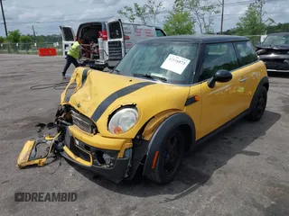 2009 MINI Hardtop with VIN WMWMF33579TT69729, listed as a IAAI auction lot 42116873 with 92,334 mi miles and . Bid and sale history available at DreamBid. Image 2.