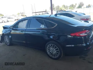 2020 Ford Fusion Titanium with VIN 3FA6P0RU8LR141324, listed as a IAAI auction lot 42004026 with 107,136 mi miles and . Bid and sale history available at DreamBid. Image 14.