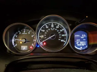 2016 Mazda CX-5 Touring z VIN JM3KE4CY7G0898598, wystawiony jako Copart lot #56717895 z przebiegiem 103 548 mil mil oraz Szkoda całkowita • Salvage title. Historia ofert i sprzedaży dostępna na DreamBid. Obrazek 9.