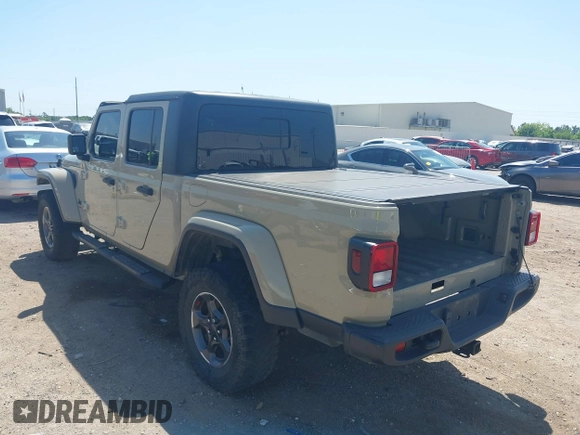 2020 Jeep Gladiator Sport S with VIN 1C6HJTAG1LL173646, listed as a IAAI auction lot 42008807 with Not Provided miles. Bid and sale history available at carsss.com. Image 3.