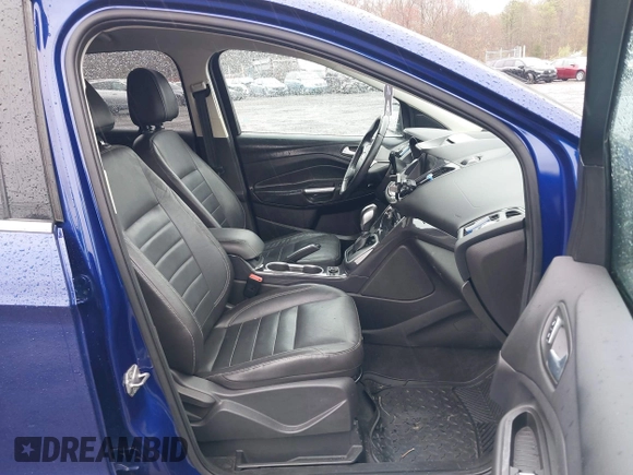 2014 Ford Escape Titanium with VIN 1FMCU9J99EUA46103, listed as a IAAI auction lot 42018097 with 169,878 mi miles and . Bid and sale history available at DreamBid. Image 5.