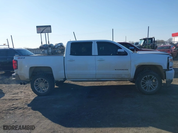 2016 Chevrolet Silverado 1500 LT with VIN 3GCUKREC6GG306239, listed as a IAAI auction lot 41380251 with 128,042 mi miles. Bid and sale history available at carsss.com. Image 14.