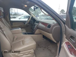 2009 GMC Yukon SLT w/4SA with VIN 1GKEC33379R300278, listed as a IAAI auction lot 41617937 with 240,623 mi miles. Bid and sale history available at carsss.com. Image 5.