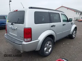 2007 Dodge Nitro SLT with VIN 1D8GU58KX7W527915, listed as a IAAI auction lot 41971181 with 167,493 mi miles. Bid and sale history available at carsss.com. Image 4.