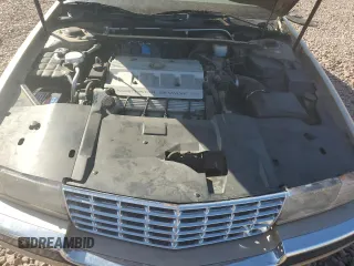 1996 Cadillac Seville Luxury SLS z VIN 1G6KS52Y9TU831614, wystawiony jako Copart lot #73215144 z przebiegiem 119 461 mil mil oraz Czysty tytuł • Clean title. Historia ofert i sprzedaży dostępna na DreamBid. Obrazek 11.
