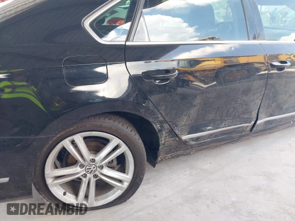 2014 Volkswagen Passat SEL Premium with VIN 1VWCN7A37EC071313, listed as a IAAI auction lot 42796404 with 78,444 mi miles and . Bid and sale history available at DreamBid. Image 14.