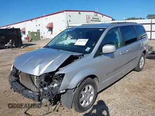 2012 Chrysler Town & Country Touring with VIN 2C4RC1BGXCR338160, listed as a IAAI auction lot 41042918 with 214,961 mi miles and . Bid and sale history available at DreamBid. Image 2.