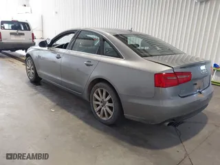2013 Audi A6 3.0T Premium Plus with VIN WAUGGAFC3DN066310, listed as a IAAI auction lot 42020702 with 195,939 mi miles. Bid and sale history available at carsss.com. Image 3.