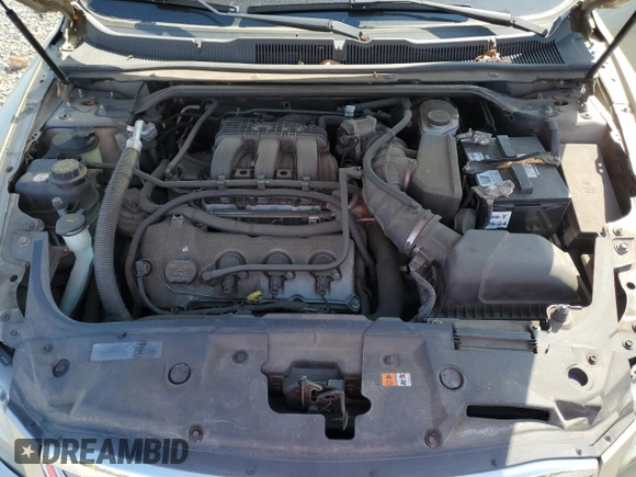 2011 Ford Taurus Limited z VIN 1FAHP2FW4BG100365, wystawiony jako Copart lot #53994645 z przebiegiem 93 803 mil mil oraz Szkoda całkowita • Salvage title. Historia ofert i sprzedaży dostępna na DreamBid. Obrazek 11.