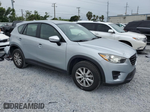2016 Mazda CX-5 Sport with VIN JM3KE4BY1G0799275, listed as a Copart auction lot 51202355 with 98,409 mi miles and Non Repairable. Bid and sale history available at carsss.com. Image 4.