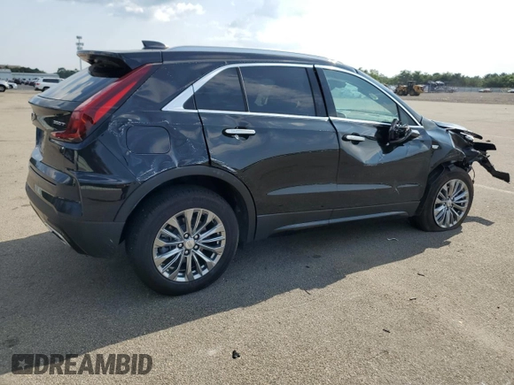 2024 Cadillac XT4 AWD Premium Luxury with VIN 1GYFZDR49RF112460, listed as a Copart auction lot 67183524 with 12,396 mi miles and Salvage title. Bid and sale history available at DreamBid. Image 3.