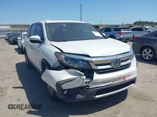 2021 Honda Pilot EX-L z VIN 5FNYF5H59MB040132, wystawiony jako IAAI lot #42008053 z przebiegiem Nie podano mil oraz . Historia ofert i sprzedaży dostępna na DreamBid. Obrazek 1.