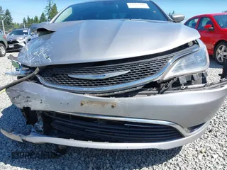 2015 Chrysler 200 Limited with VIN 1C3CCCAB1FN595950, listed as a IAAI auction lot 42627486 with 217,578 mi miles and . Bid and sale history available at DreamBid. Image 18.