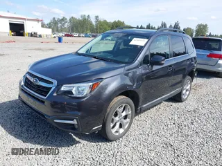 2018 Subaru Forester Touring with VIN JF2SJAWC6JH608722, listed as a IAAI auction lot 42309259 with 93,426 mi miles and . Bid and sale history available at DreamBid. Image 2.