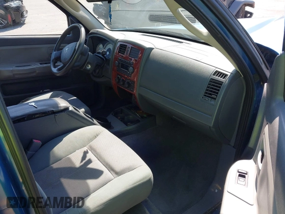2005 Dodge Dakota SLT with VIN 1D7HW48N05S319621, listed as a IAAI auction lot 42037140 with 251,595 mi miles and . Bid and sale history available at DreamBid. Image 5.