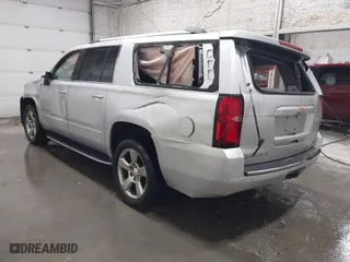 2017 Chevrolet Suburban Premier with VIN 1GNSKJKC0HR179235, listed as a IAAI auction lot 41301181 with 131,698 mi miles. Bid and sale history available at carsss.com. Image 3.