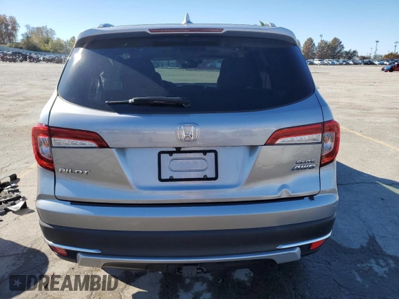 2019 Honda Pilot Elite with VIN 5FNYF6H0XKB059988, listed as a Copart auction lot 74472194 with 63,742 mi miles and Salvage title. Bid and sale history available at DreamBid. Image 6.