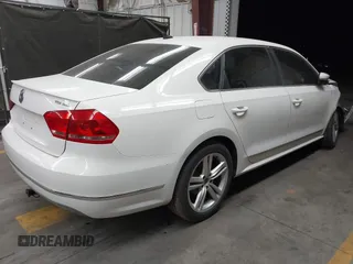 2013 Volkswagen Passat TDI SEL Premium with VIN 1VWCN7A39DC011421, listed as a IAAI auction lot 42042189 with 141,670 mi miles. Bid and sale history available at carsss.com. Image 4.
