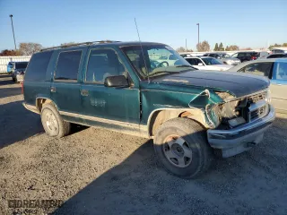 1995 Chevrolet Tahoe with VIN 1GNEK13K0SJ445250, listed as a Copart auction lot 82987024 with 125,517 mi miles and Salvage Title. Bid and sale history available at carsss.com. Image 4.
