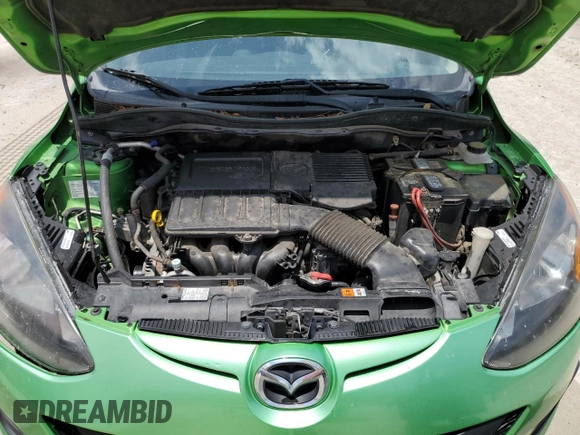 2012 Mazda 2 Sport with VIN JM1DE1KZ5C0141784, listed as a Copart auction lot 56498295 with 132,602 mi miles and Salvage Title. Bid and sale history available at DreamBid. Image 11.