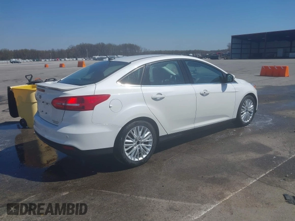 2016 Ford Focus Titanium с VIN 1FADP3J27GL359200, выставлен на аукционе IAAI как лот 42005989 с пробегом 135 589 миль миль и . История ставок и продаж доступна на DreamBid. Изображение 4.