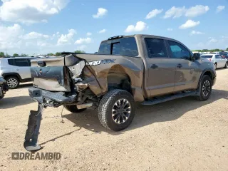 2021 Nissan Titan Pro-4X with VIN 1N6AA1EDXMN523826, listed as a Copart auction lot 61851765 with 85,783 mi miles and Salvage title. Bid and sale history available at DreamBid. Image 3.