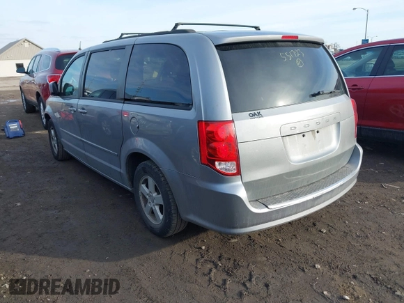 2013 Dodge Grand Caravan SXT with VIN 2C4RDGCG8DR551723, listed as a IAAI auction lot 41510574 with 183,432 mi miles and . Bid and sale history available at DreamBid. Image 3.