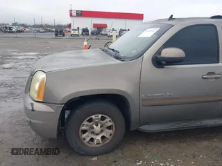 2007 GMC Yukon XL SLT with VIN 1GKFK16327J266852, listed as a IAAI auction lot 41198942 with 243,905 mi miles. Bid and sale history available at carsss.com. Image 11.