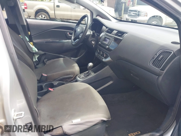 2016 Kia Rio LX with VIN KNADM4A33G6638575, listed as a IAAI auction lot 41828931 with 76,220 mi miles. Bid and sale history available at carsss.com. Image 5.