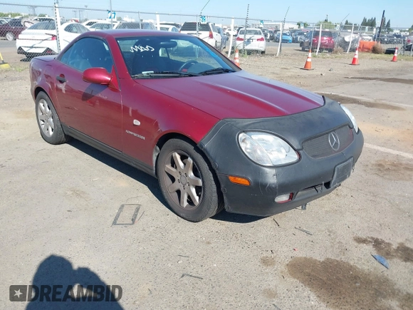 1999 Mercedes-Benz SLK 230/320 with VIN WDBKK47F5XF112125, listed as a IAAI auction lot 42207615 with 93,962 mi miles and . Bid and sale history available at DreamBid. Image 1.