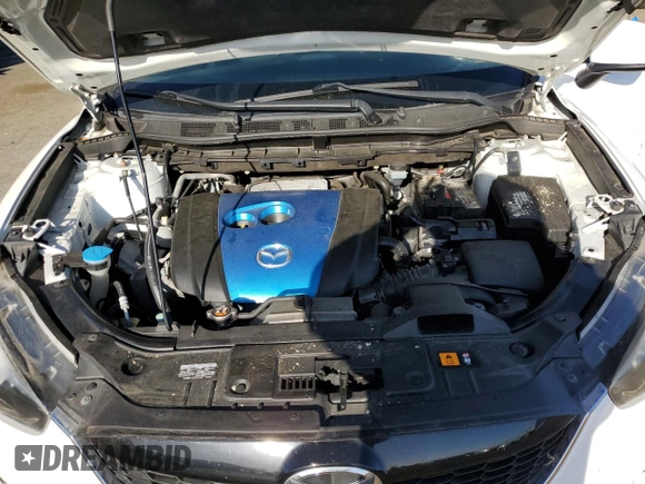 2013 Mazda CX-5 Sport with VIN JM3KE2BE7D0148951, listed as a Copart auction lot 57782115 with 65,677 mi miles and Salvage title. Bid and sale history available at DreamBid. Image 11.