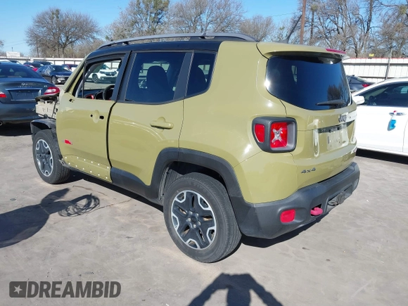 2015 Jeep Renegade Trailhawk with VIN ZACCJBCT6FPC11721, listed as a IAAI auction lot 41759053 with 95,499 mi miles and . Bid and sale history available at DreamBid. Image 3.