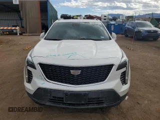 2022 Cadillac XT4 FWD Sport z VIN 1GYFZER47NF165920, wystawiony jako Copart lot #50389935 z przebiegiem 57 410 mil mil oraz Szkoda całkowita • Salvage title. Historia ofert i sprzedaży dostępna na DreamBid. Obrazek 5.