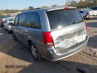 2014 Dodge Grand Caravan SXT z VIN 2C4RDGCG4ER262792, wystawiony jako IAAI lot #40460534 z przebiegiem 245 407 mil mil oraz . Historia ofert i sprzedaży dostępna na DreamBid. Obrazek 3.