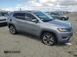 2020 Jeep Compass Limited with VIN 3C4NJCCB3LT128807, listed as a Copart auction lot 56673705 with 94,903 mi miles and Salvage title. Bid and sale history available at DreamBid. Image 4.