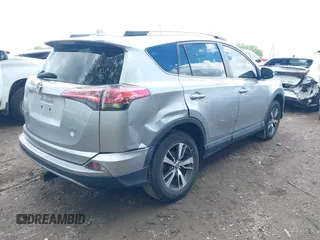 2018 Toyota RAV4 XLE z VIN 2T3WFREV1JW427878, wystawiony jako IAAI lot #42191031 z przebiegiem 97 264 mil mil oraz . Historia ofert i sprzedaży dostępna na DreamBid. Obrazek 4.