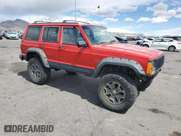1996 Jeep Cherokee Sport with VIN 1J4FJ68S6TL213886, listed as a Copart auction lot 51462275 with 215,091 mi miles and Salvage title. Bid and sale history available at DreamBid. Image 4.