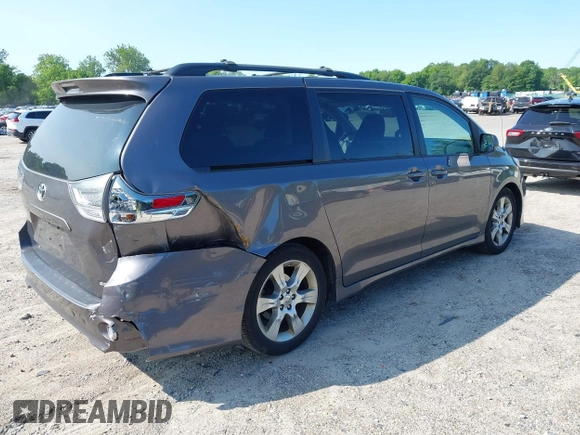 2012 Toyota Sienna SE with VIN 5TDXK3DCXCS267405, listed as a IAAI auction lot 42401101 with 134,553 mi miles and . Bid and sale history available at DreamBid. Image 4.