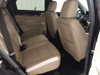 2019 Cadillac XT5 Premium Luxury AWD z VIN 1GYKNFRSXKZ189590, wystawiony jako IAAI lot #41316561 z przebiegiem 98 755 mil mil oraz . Historia ofert i sprzedaży dostępna na DreamBid. Obrazek 8.