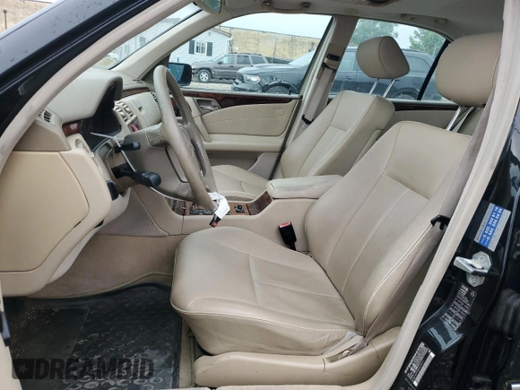 1999 Mercedes-Benz E-Class with VIN WDBJF65H9XA929577, listed as a Copart auction lot 71932364 with 84,806 mi miles and Salvage Title. Bid and sale history available at carsss.com. Image 7.