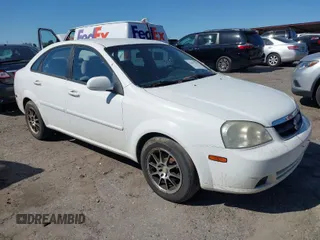 2008 Suzuki Forenza z VIN KL5JD56Z28K732132, wystawiony jako IAAI lot #42057556 z przebiegiem 80 402 mil mil oraz . Historia ofert i sprzedaży dostępna na DreamBid. Obrazek 1.